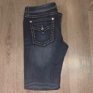 Miss Me signature rose-boot cut. Size 33. Never been worn or washed.